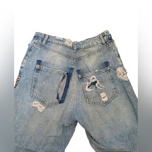 Distressed jean with cheetah down the leg!